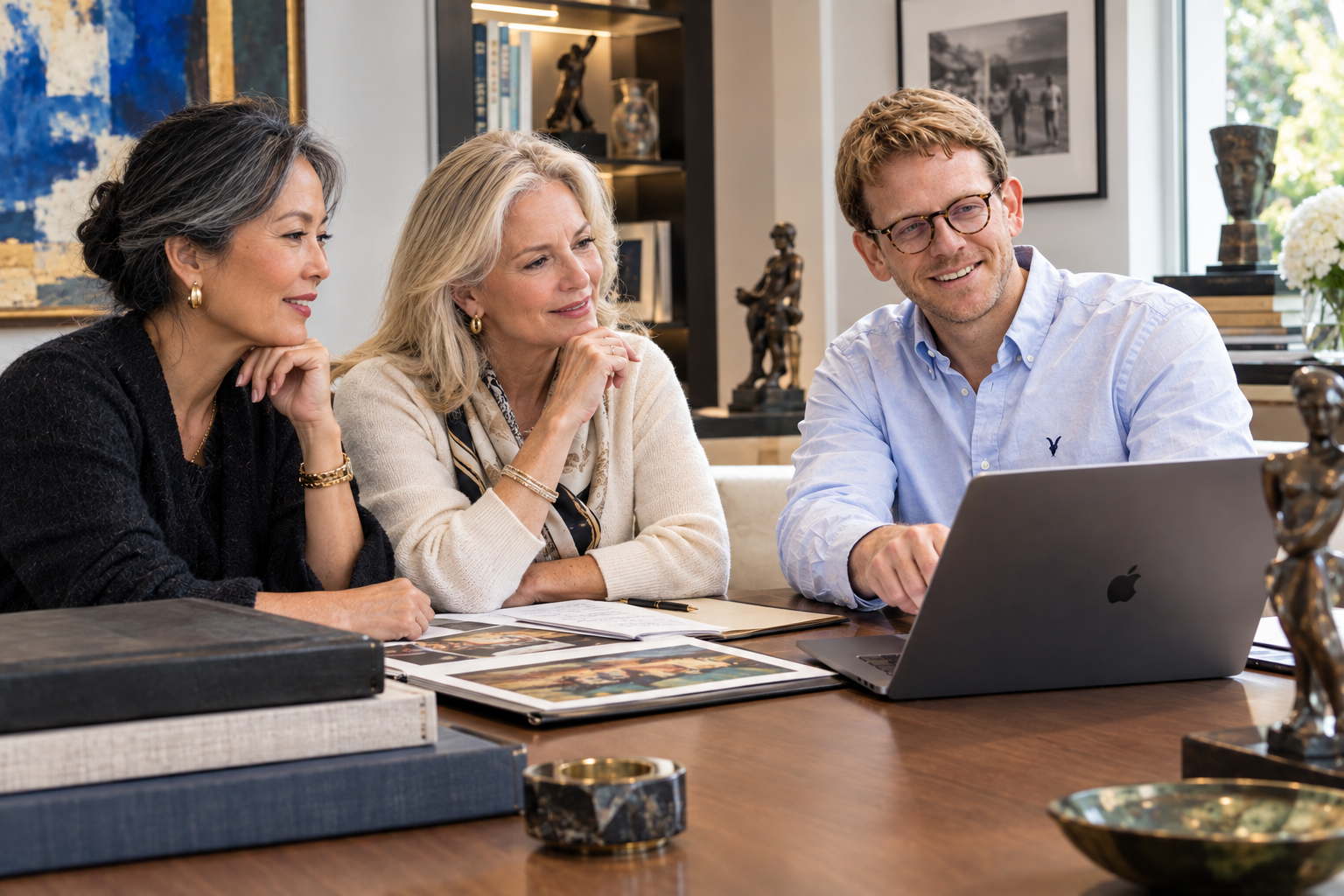 Advisors reviewing an estate on a laptop